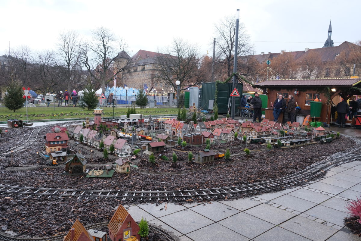 functional model train railway and scale village at Christmas market