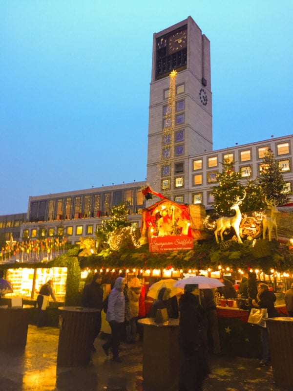 city hall aglow with holiday lights