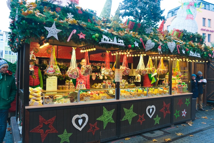 Christmas market booth with a variety of treats