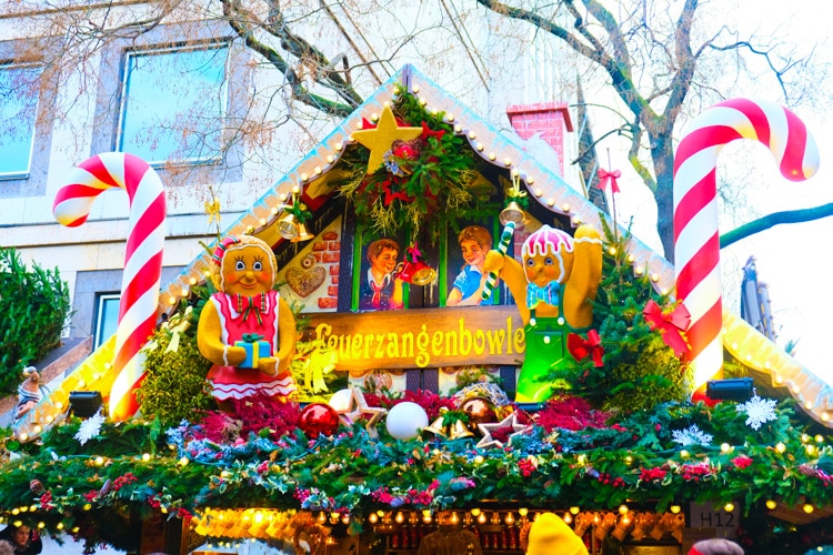 colorful and elaborate decoration on top of Christmas booth