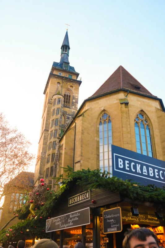 Marketplace next to church on sunny day