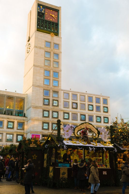 City hall with advent calendar and Christmas market