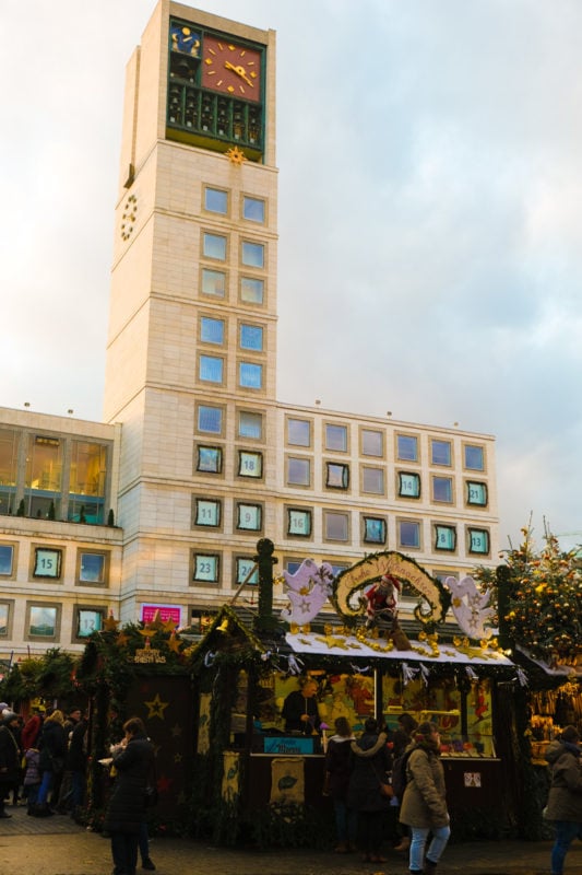 City hall with advent calendar and Christmas market