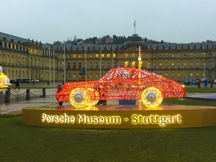 Schlossplatz, Stuttgart with Porsche Museum car in lights