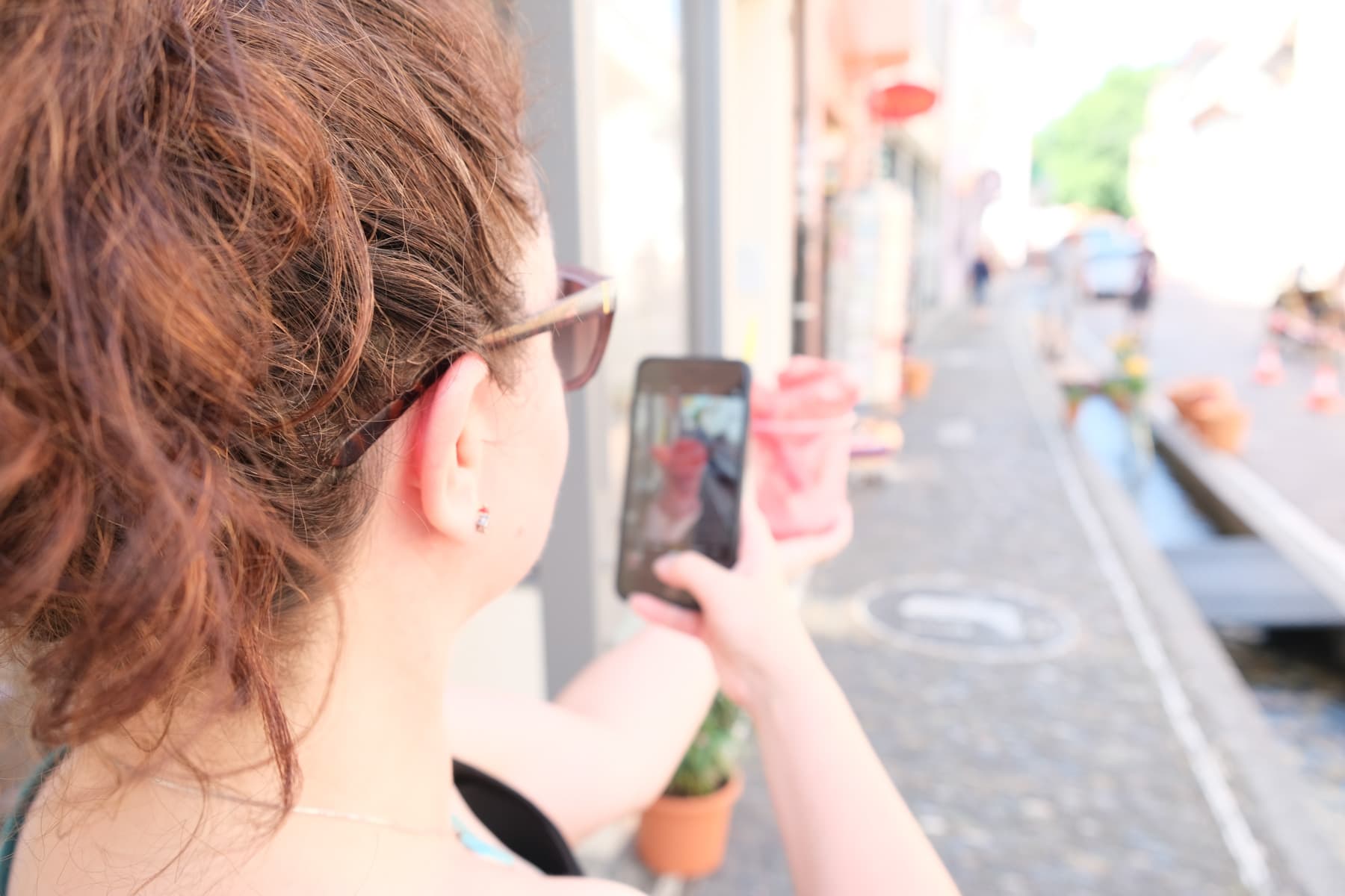 Cate taking photo in Freiburg 