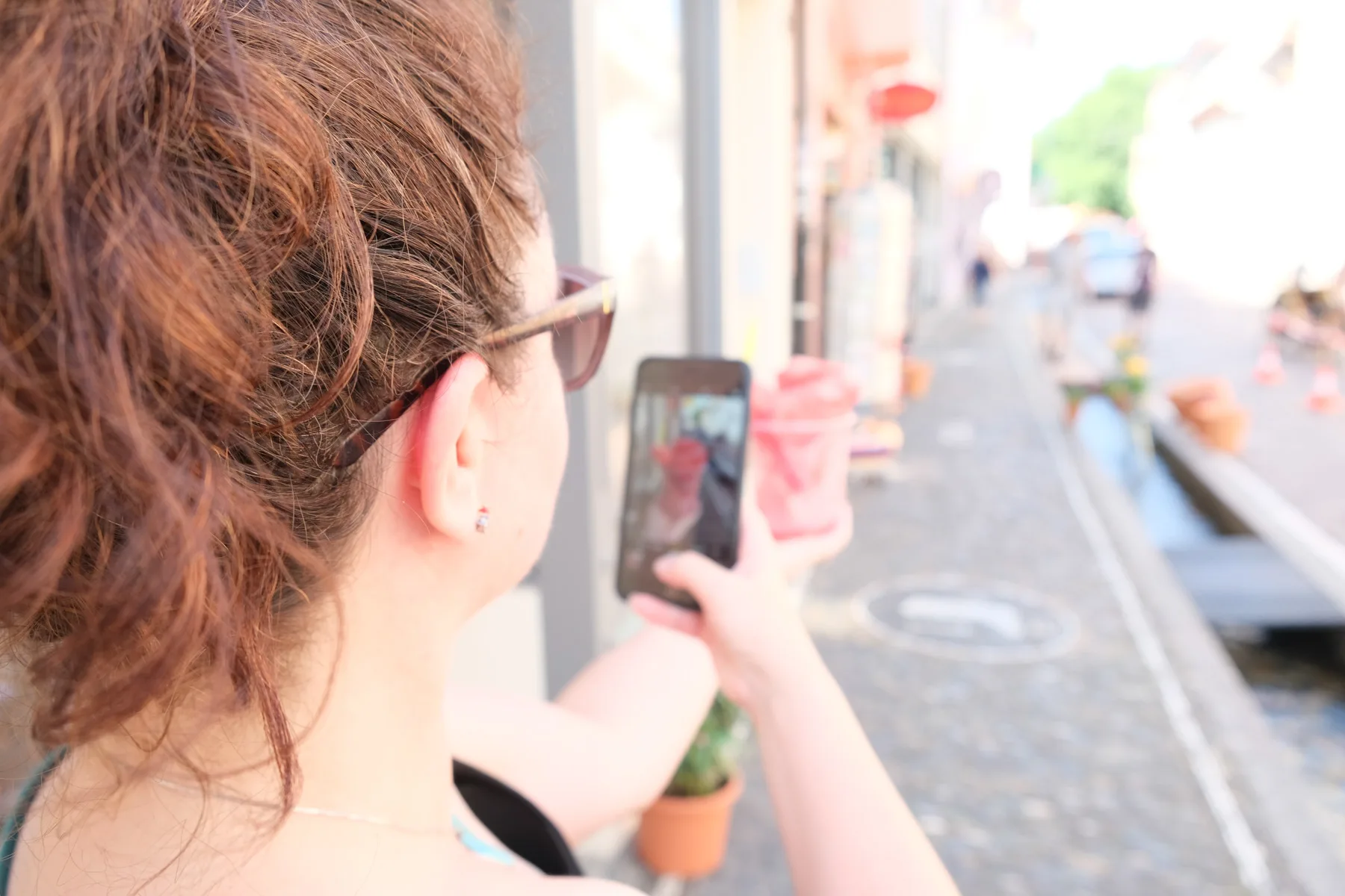 Cate taking photo in Freiburg