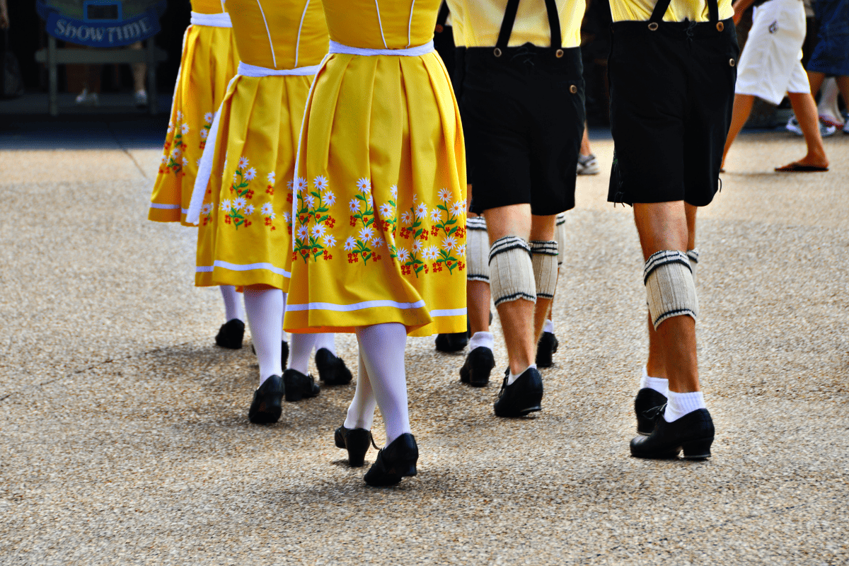 Traditional men's and women's festival clothing worn during dance