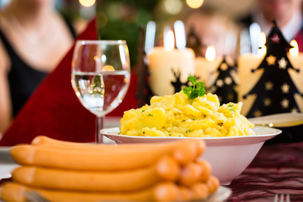 Christmas eve dinner with sausages and potato salad 