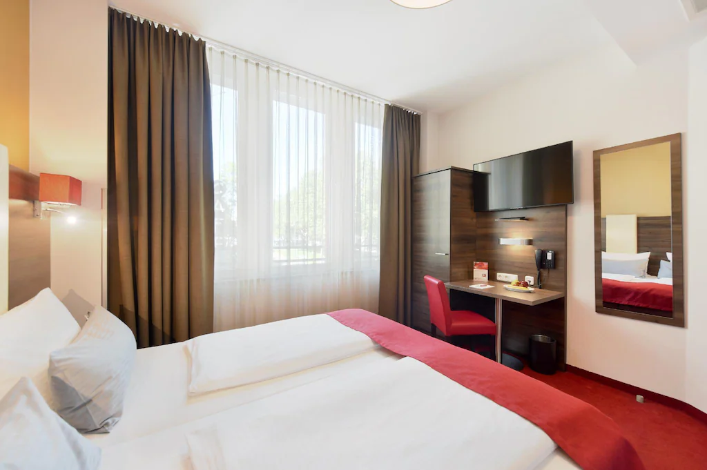 KOOS Hotel & Apartments - City Aparthotel