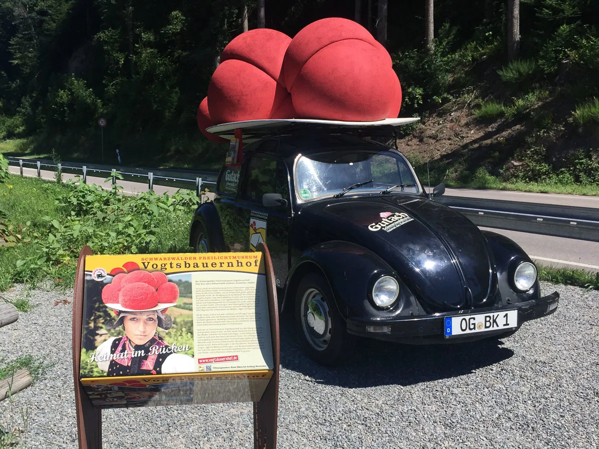 Black forest hat and car